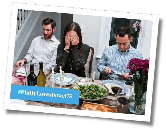 Photo of young adults at a Shabbat meal